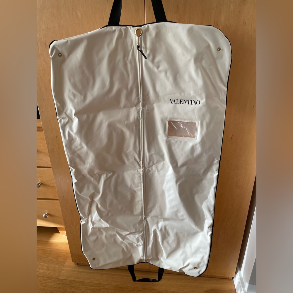 Valentino garment bag. Water resistant bag with zipper. Very good condition.